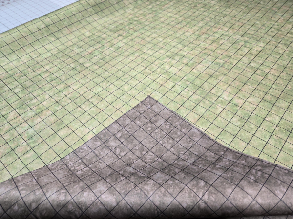 Double Sided Wasteland/Grassland with 1" grid GripMat printed on both sides Perfect for Miniatures, 40k, and board games of all kinds!